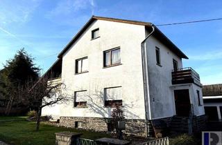 Einfamilienhaus kaufen in 56412 Nomborn, Nomborn - Freist. Einfamilienhaus mit drei Garagen, Carport und Garten