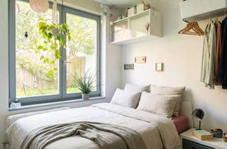 Wohnung kaufen in 65843 Sulzbach, Erdgeschosswohnung mit Garten im Architektenhaus