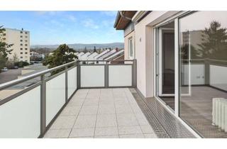Wohnung kaufen in 55218 Ingelheim, Großzügige 4‑Zimmer‑Wohnung mit zwei Balkonen und Blick auf den Rhein