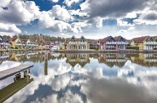 Doppelhaushälfte kaufen in 16831 Rheinsberg, Exklusive Doppelhaushälfte mit Carport - Ferienimmobilie am Wasser mit eigenem Bootsanleger