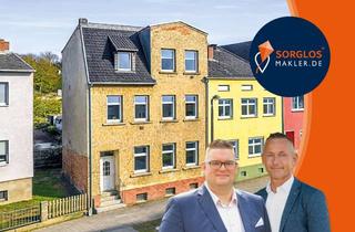 Haus kaufen in 39218 Schönebeck, Charmantes Reihenendhaus mit Gartenidylle und vielseitigem Raumkonzept auf drei Ebenen