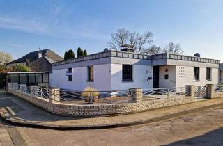 Haus kaufen in 52441 Linnich, Bungalow mit Doppelgarage, Keller und pflegeleichtem Garten in ruhiger Lage von Linnich Welz