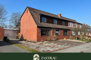 Doppelhaushälfte kaufen in 26409 Wittmund, Doppelhaushälfte mit zwei Wohneinheiten in Wittmund wartet auf neuen Glanz