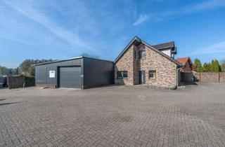 Einfamilienhaus kaufen in 49624 Löningen, Stilvolles Einfamilienhaus mit Gewerbehalle in zentraler Lage