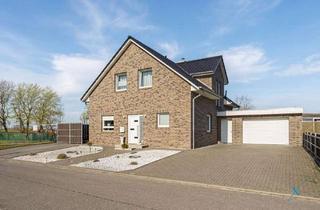 Einfamilienhaus kaufen in 25770 Hemmingstedt, Einfamilienhaus mit viel Platz, toller Ausstattung und schönen angelegtem Garten in Sackgassenlage