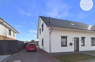 Doppelhaushälfte kaufen in 49685 Emstek, Stilvolle Doppelhaushälfte mit moderner Ausstattung und Garten