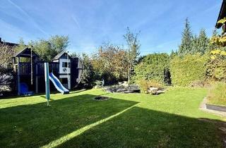 Haus kaufen in 33758 Schloß Holte-Stukenbrock, Freistehender Bungalow mit großem Garten, Wintergarten & PV-Anlage