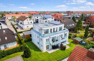 Wohnung kaufen in 21629 Neu Wulmstorf, KfW-55 Gartenwohnung mit 160 m² Garten, SW-Terrasse, Parkett & Carport