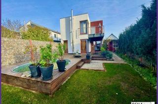 Einfamilienhaus kaufen in 49143 Bissendorf, Modernes Familienhaus mit Pool, Doppelgarage und hochwertiger Ausstattung im Zentrum von Bissendorf