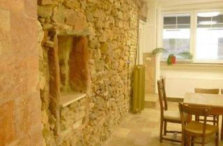 Wohnung mieten in Am Markt, 55276 Oppenheim, Charaktervolle EG-Wohnung mit Naturstein, Stuck und großzügiger Fensterfront