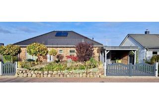 Haus kaufen in 23774 Heiligenhafen, Exklusiver Küstenbungalow mit Wintergarten und Meerblick auf Eigenland