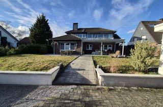 Haus kaufen in 47495 Rheinberg, Freistehendes Zweifamilienhaus, 915 m² Südgrundstück ruhige Wohnlage in Rheinberg