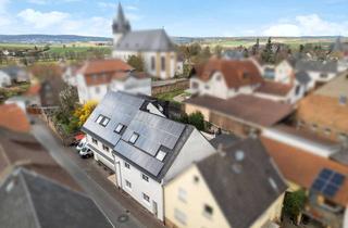 Anlageobjekt in 35519 Rockenberg, Modernisiertes Wohn- und Geschäftshaus in zentraler Lage von Rockenberg