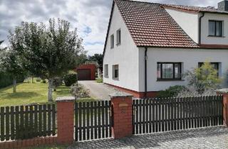 Doppelhaushälfte kaufen in 16227 Eberswalde, Eberswalde - Haus mit Doppelgarage und schönem Garten