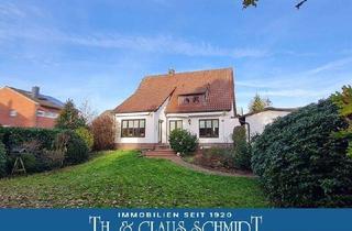 Haus kaufen in 26180 Rastede, Rastede - Modernisiertes Wohnhaus mit Bauplatz in zentraler Lage von Rastede