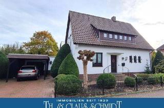 Haus kaufen in 26180 Rastede, Rastede - Modernisiertes Wohnhaus mit Garage und Carport in zentraler Lage von Rastede