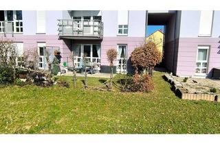 Wohnung kaufen in 65428 Rüsselsheim, Helle 2 Zimmer Wohnung mit Garten und TG Stellplatz