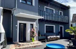 Haus kaufen in 61194 Niddatal, Charmantes kleines Wohnhaus mit Balkon – ca. 90 m² in zentraler Lage von Niddatal-Assenheim