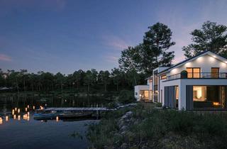 Haus kaufen in 25715 Eddelak, Ein Statement der Architektur: Zeitlose Ästhetik trifft auf urbanes Flair.