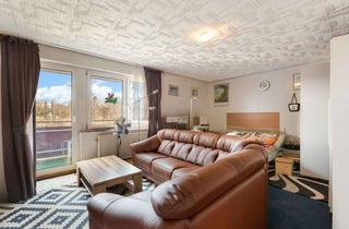 Wohnung kaufen in 51381 Lützenkirchen, Sanierungsbedürftige Etagenwohnung in Leverkusen-Lützenkirchen