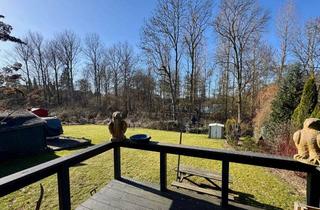 Haus kaufen in 23701 Eutin, Traumhaftes Grundstück am See - charmantes Wohnhaus mit Anbau