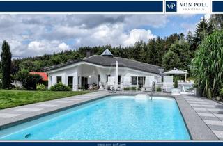 Villa kaufen in 61389 Schmitten, Exklusive Architektenvilla mit Kamin und repräsentativem Pool- und Gartenbereich in Waldrandlage