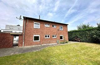 Haus kaufen in 41569 Rommerskirchen, Rommerskirchen - Modernisiertes Zweifamilienhaus mit vielen Nutzungsmöglichkeiten