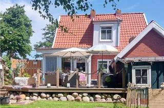 Einfamilienhaus kaufen in 26759 Hinte, Hinte - Modernisiertes Einfamilienhaus mit großem Garten in ruhiger Lage