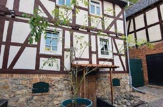Einfamilienhaus kaufen in 35102 Lohra, Lohra - Charmantes Fachwerk-Einfamilienhaus mit Innenhof, überdachter Terrasse & Garage in Lohra