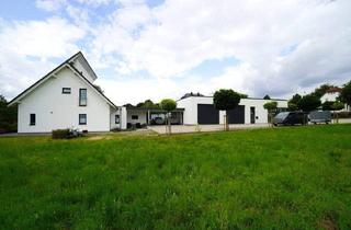 Einfamilienhaus kaufen in 32825 Blomberg, Blomberg / Herrentrup - Moderne Wohn- und Geschäftsimmobilie im Ortsteil von Blomberg bietet Ihnen viele Optionen