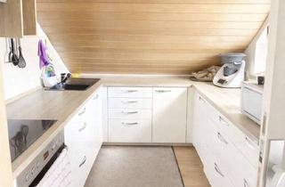 Wohnung kaufen in 73540 Heubach, Helle 3-Zimmer-Dachgeschosswohnung mit Balkon, Wintergarten und Garage.