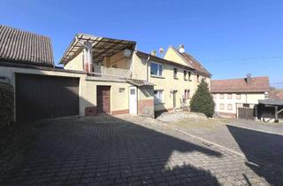 Doppelhaushälfte kaufen in 97839 Esselbach, Doppelhaushälfte mit Gartengrundstück und Nebengebäuden – viel Potenzial für Handwerker