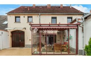 Einfamilienhaus kaufen in 06869 Coswig, Familienfreundliches Einfamilienhaus mit 6 Zimmern, schönem Innenhof und Garten
