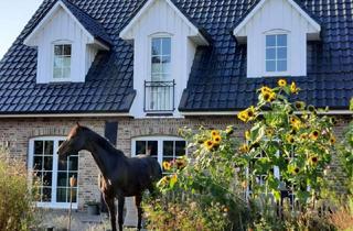 Einfamilienhaus kaufen in 21629 Neu Wulmstorf, Einfamilienhaus im Friesenstil mit Doppelgarage und Garten