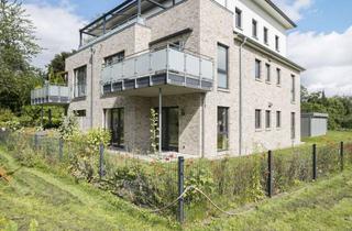 Wohnung kaufen in Neversfelder Str. 8A, 23714 Malente, Eine Eigentumswohnung, die wie neu gebaut erscheint, kaum benutzt wurde und bezugsfertig ist.