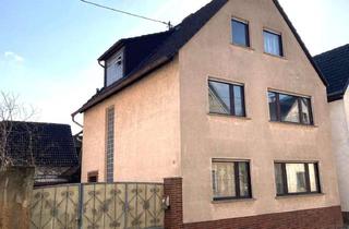 Einfamilienhaus kaufen in 55296 Lörzweiler, Solides Einfamilienhaus • Südterrasse • Innenhof • 2 Garagen • Alter Ortskern • Lörzweiler