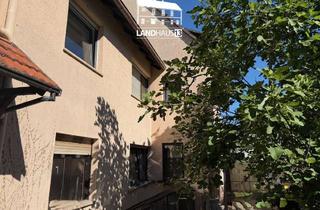 Einfamilienhaus kaufen in 55296 Lörzweiler, Familienfreundliches Einfamilienhaus mit Innenhöfchen, Terrasse und Garagen • Ortslage in Lörzweiler