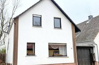 Einfamilienhaus kaufen in 55268 Nieder-Olm, Bezahlbares freistehendes Einfamilienhaus in zentraler Lage von Nieder-Olm