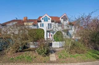 Reihenhaus kaufen in 61231 Bad Nauheim, Stadtnah und ruhig wohnen in der Kernstadt – großzügiges und modernisiertes Reihenmittelhaus