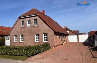 Haus kaufen in 26553 Dornum, Zweifamilienhaus mit fest vermietetem Obergeschoss