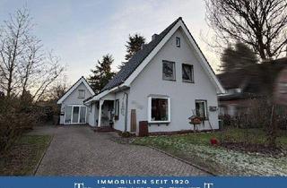 Haus kaufen in 26209 Hatten, Hatten - Teilmodernisiertes Wohnhaus mit Einliegerwohnung, Teilkeller & großem Grundstück in Kirchhatten