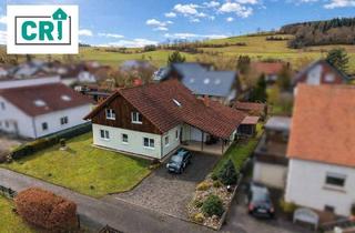 Einfamilienhaus kaufen in 35288 Wohratal, Wohratal - Großzügiges Einfamilienhaus mit Garten, Balkon und überdachter Terrasse in ruhiger Lage von Halsdorf