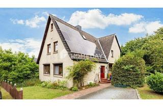 Einfamilienhaus kaufen in 27711 Osterholz-Scharmbeck, Osterholz-Scharmbeck - Charmantes Einfamilienhaus mit Loggia, Terrasse und großem Garten