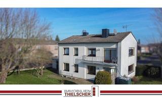 Haus kaufen in 52499 Baesweiler, Baesweiler / Loverich - Freistehendes Zweifamilienhaus mit Garagen in naturnaher Lage am Ortsrand von Loverich