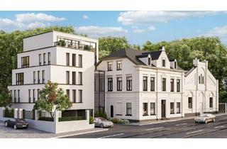 Wohnung kaufen in 40629 Düsseldorf, Düsseldorf - Dachgeschosswohnung mit zwei Balkonen in der denkmalgeschützten Löwenburg