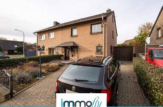 Doppelhaushälfte kaufen in 52445 Titz, Titz - Familienfreundliche Doppelhaushälfte in Titz mit zusätzlicher Nutzfläche für Kinder & Home-Office