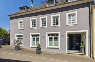 Haus kaufen in 54649 Waxweiler, Waxweiler - 3 Wohneinheiten plus Gewerbe im Ortskern von Waxweiler