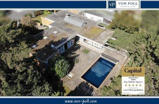 Haus kaufen in 67125 Dannstadt-Schauernheim, Dannstadt-Schauernheim - Blickgeschützter Bungalow mit Einliegerbereich und großem Grundstück