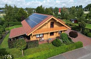 Einfamilienhaus kaufen in 26349 Jade, Jade - **Einmalig in Jaderberg** Einzigartiges Holzhaus mit grünem Grundstück und direkter Lage am Wasser