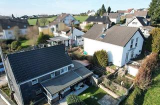 Mehrfamilienhaus kaufen in 51399 Burscheid, Burscheid / Heddinghofen - Vermietetes Gebäudeensemble mit 5 Wohneinheiten und 4 Garagen in idyllischer Randlage von Burscheid